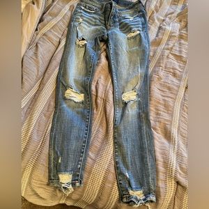 Buckle black skinny jeans 24